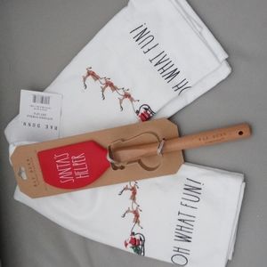Rae DunnTwo kitchen towels spatula and a cookie cutter Rae Dunn